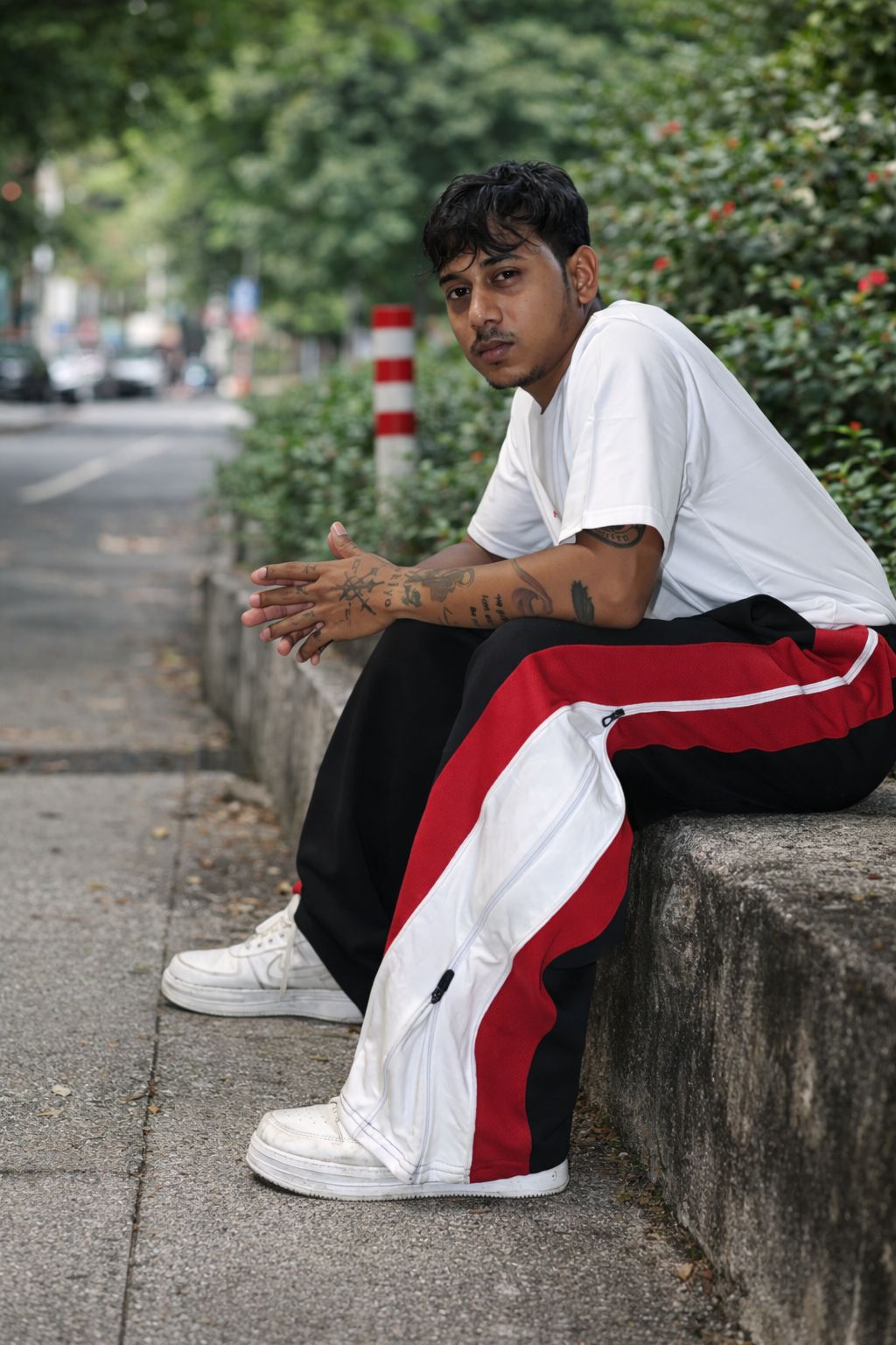 Crimson Split Zip Track Pants – Black with Red/White Panel - Image 1